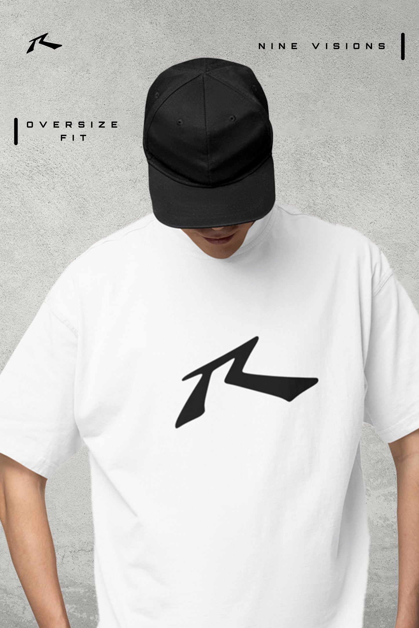 Person wearing a white t-shirt with a black logo and a black cap on a gray background