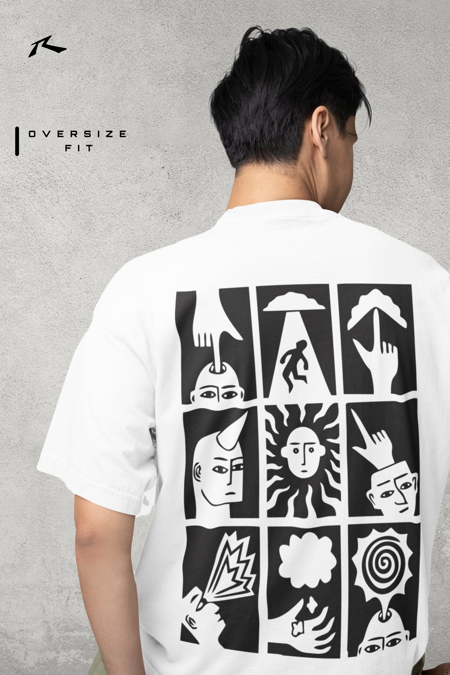 Person wearing a white t-shirt with black abstract designs on the back, on a gray background.