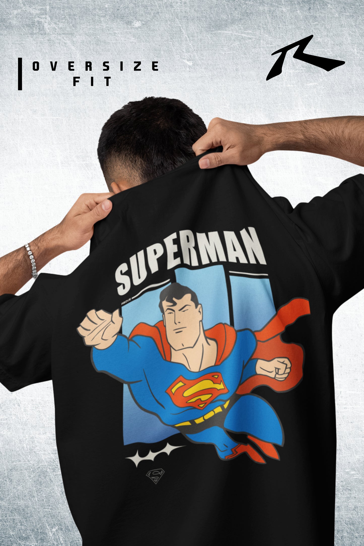 Black t-shirt with Superman graphic and text 'Oversize Fit' on a gray background