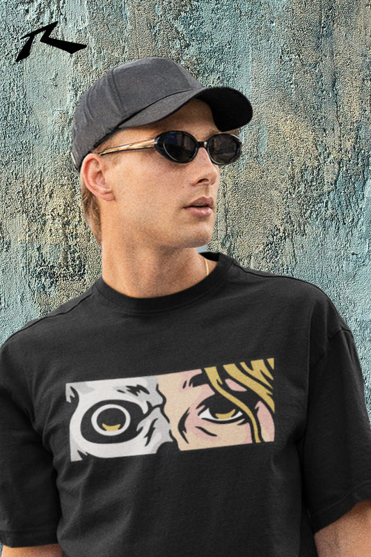 Man wearing a black t-shirt with a graphic design, sunglasses, and a cap against a textured wall.