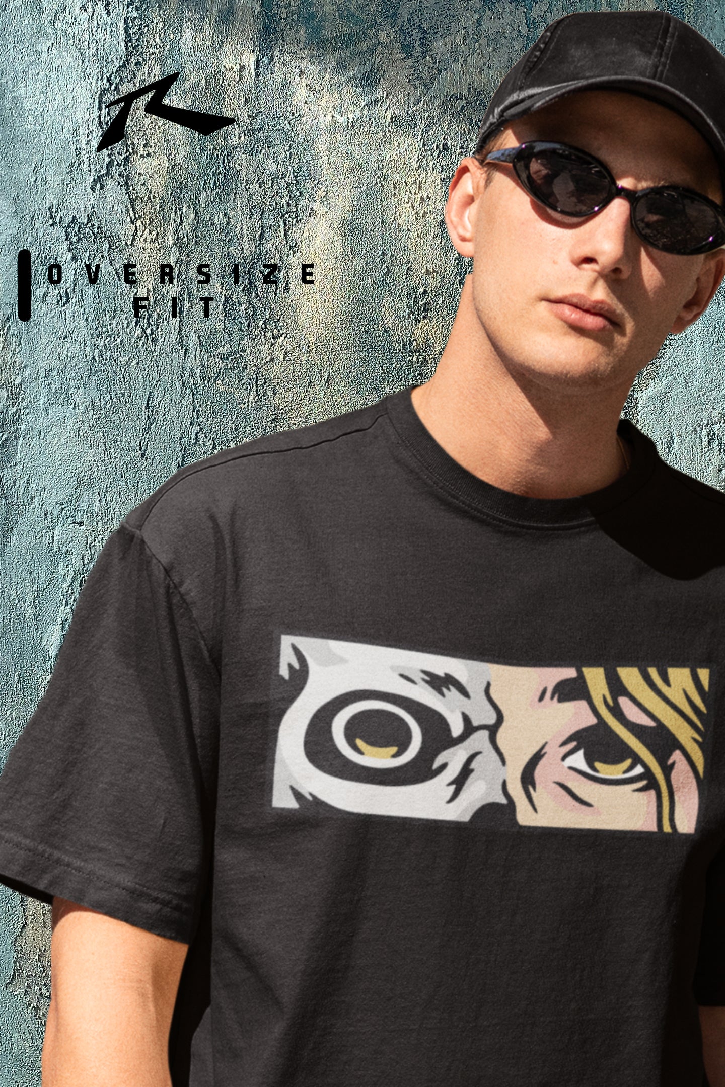 Man wearing a black t-shirt with a graphic design, standing against a textured wall.